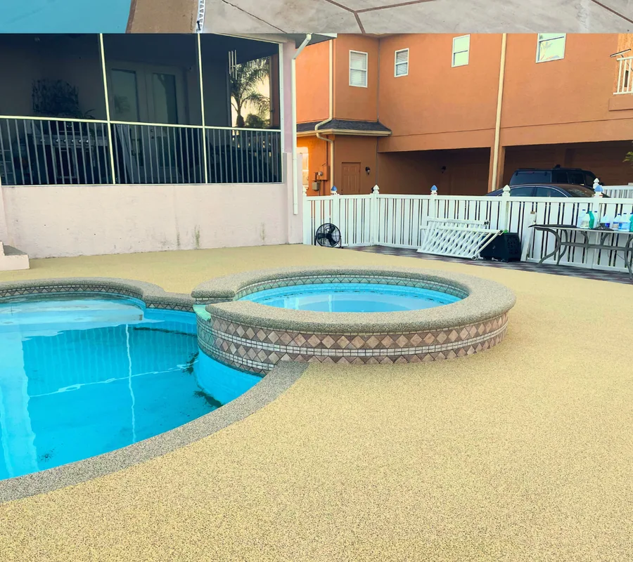Pool deck after renovation with a warm tan rubber surface around the spa